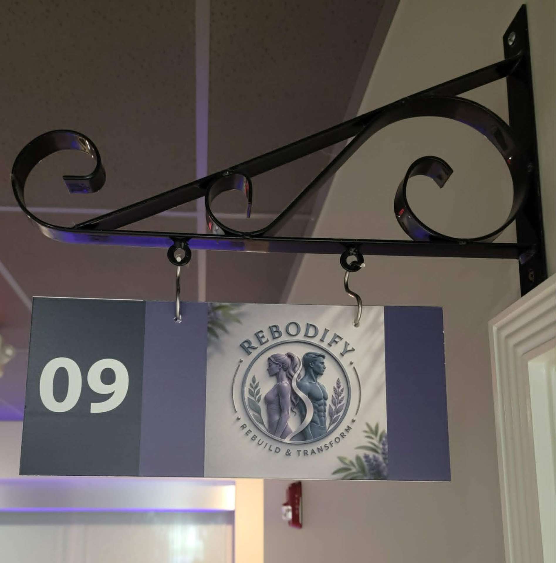 Rebodify suite 09 sign inside Talk of the Town Luxury Salon Suites